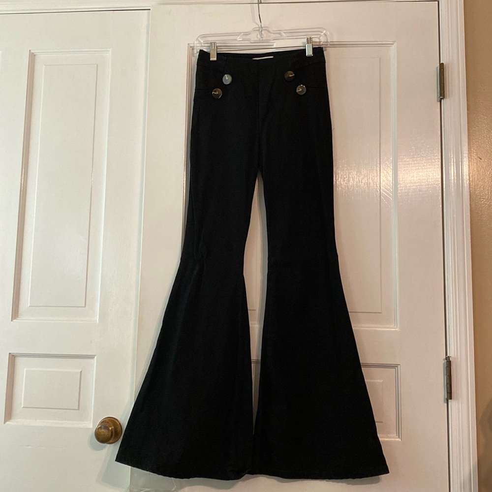 Boutique black dress pants with button detail & side zip
